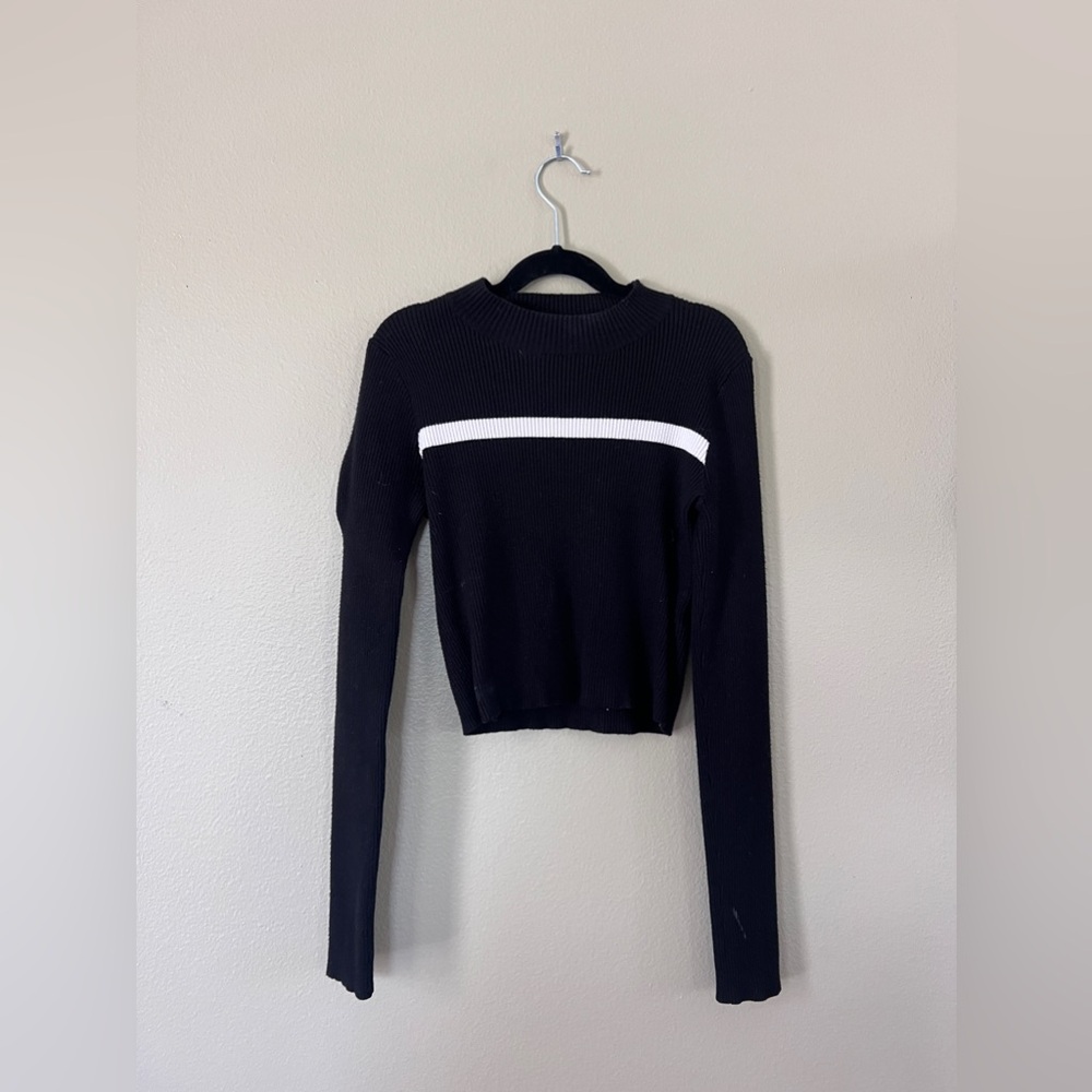 brandy Melville, black, long sleeve, crop top with a white line above the chest.